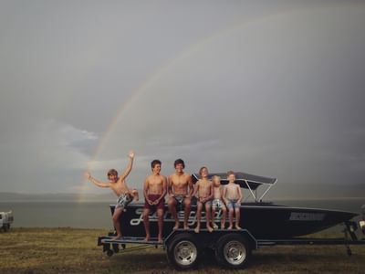 Kids with boat on the shores of Lake Burrendong